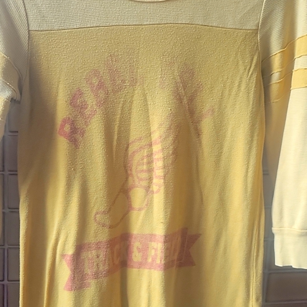 Rebel Yell yellow shirt